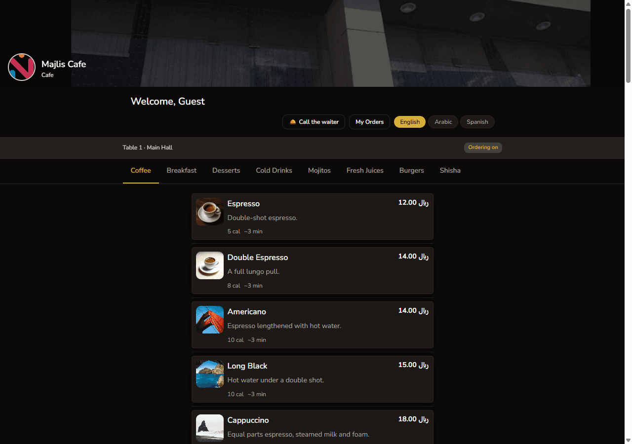 Desktop view of the Majlis Cafe guest menu showing categories, waiter call, and coffee items